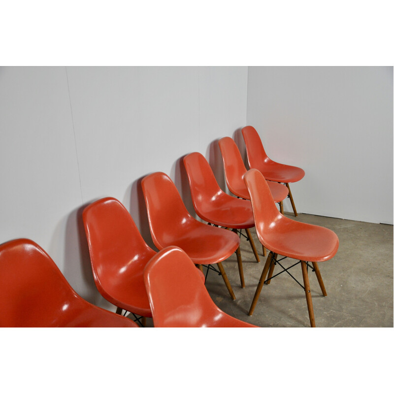 Set of 12 vintage red chairs by Eames for Miller 1970