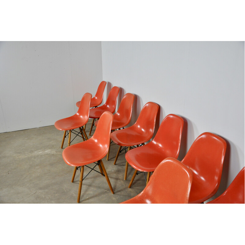 Set of 12 vintage red chairs by Eames for Miller 1970