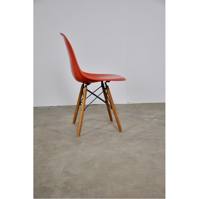 Set of 12 vintage red chairs by Eames for Miller 1970