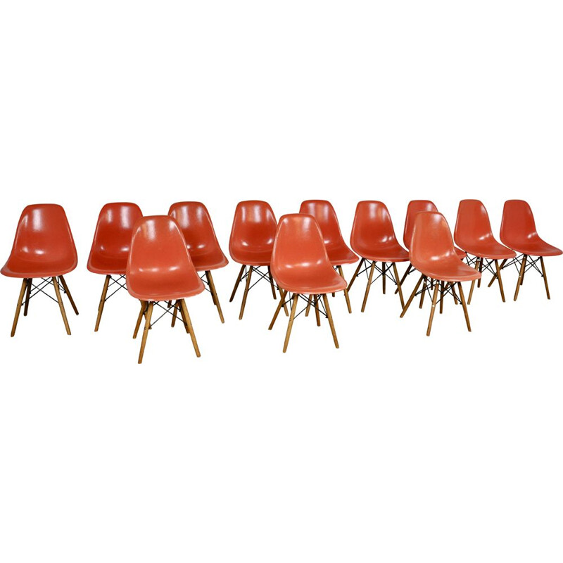 Set of 12 vintage red chairs by Eames for Miller 1970