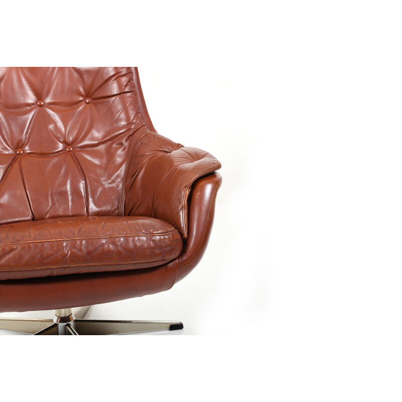 Vintage danish swivel lounge chair in brown leather 1960