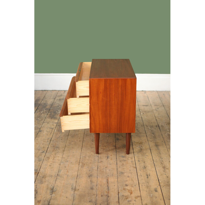 Low vintage chest of drawers in teak 1950