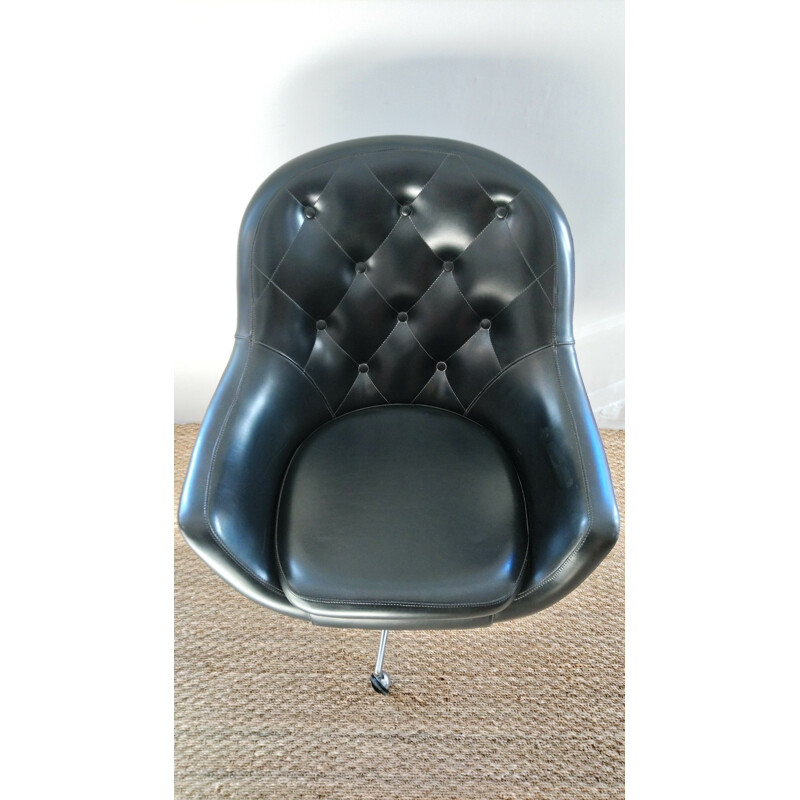 Vintage shell swivelling armchair in black leatherette and metal 1960