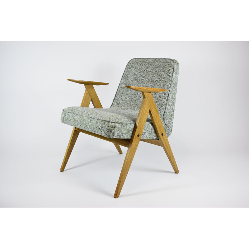 Vintage armchair in green fabric and wood 1970