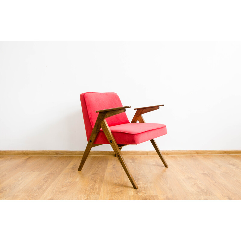 Vintage armchair in beech and red fabric