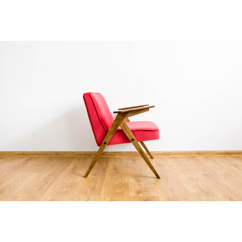 Vintage armchair in beech and red fabric