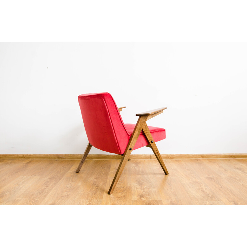 Vintage armchair in beech and red fabric