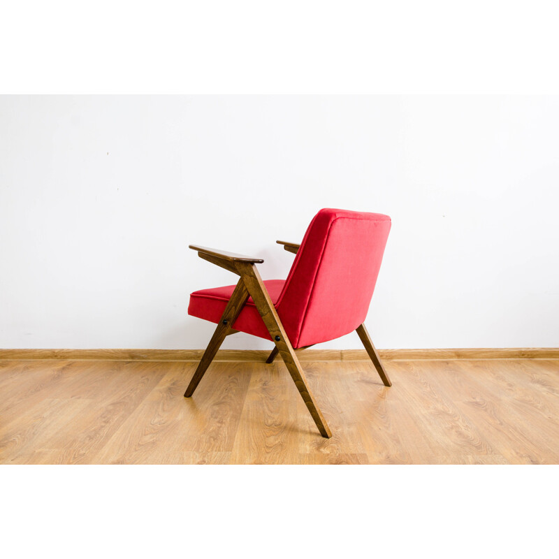 Vintage armchair in beech and red fabric