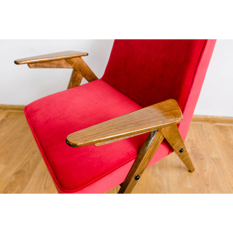 Vintage armchair in beech and red fabric