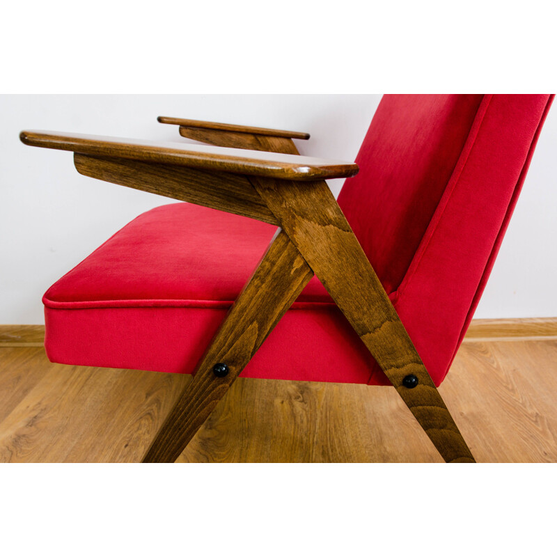 Vintage armchair in beech and red fabric