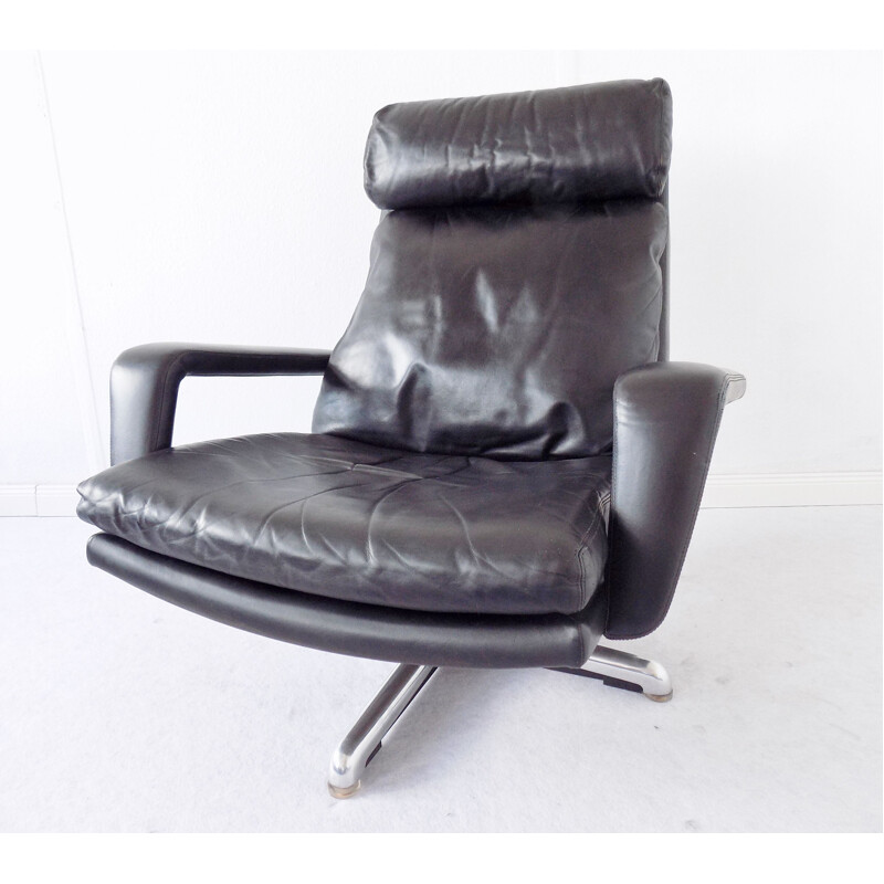 Black leather armchair by Hans Kaufeld