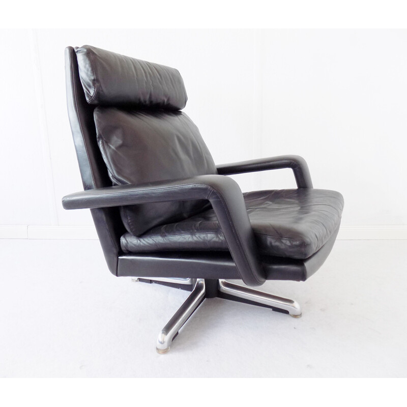Black leather armchair by Hans Kaufeld
