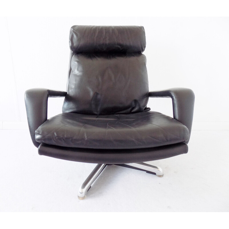 Black leather armchair by Hans Kaufeld