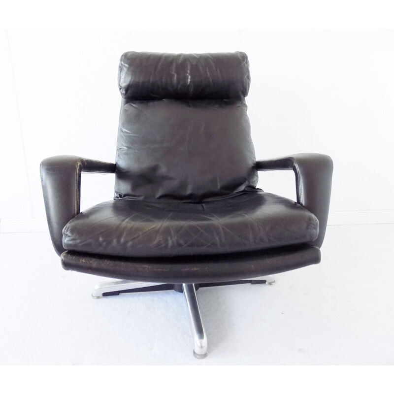 Vintage black armchair by Hans Kaufeld