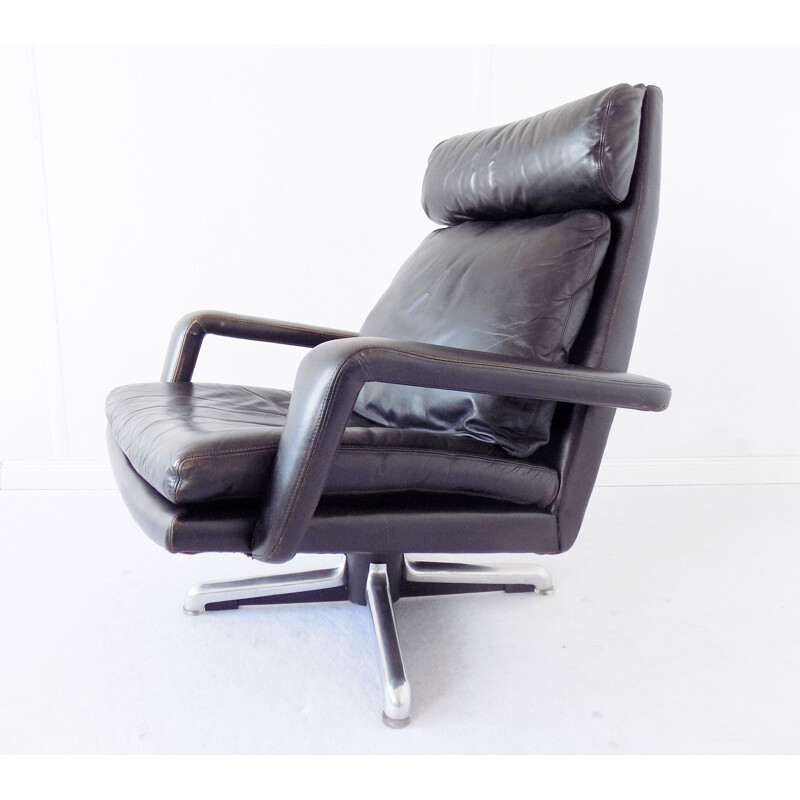 Vintage black armchair by Hans Kaufeld