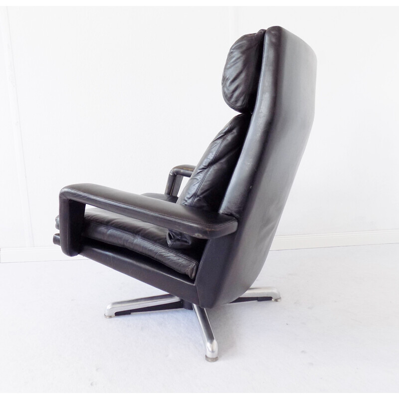 Vintage black armchair by Hans Kaufeld