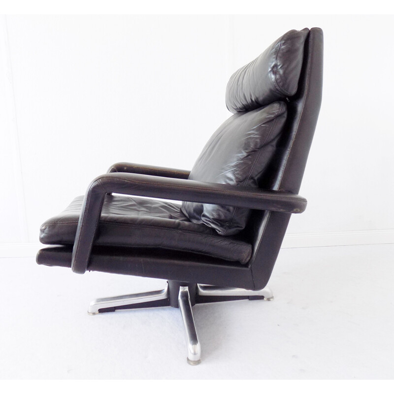 Vintage black armchair by Hans Kaufeld