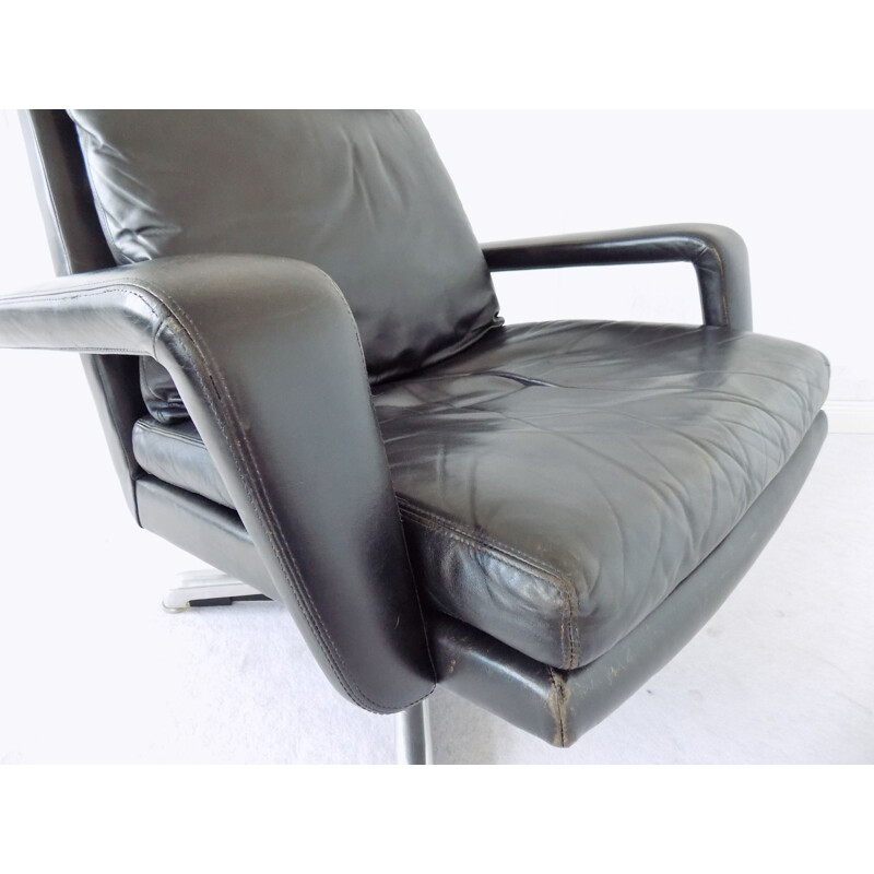 Vintage black armchair by Hans Kaufeld