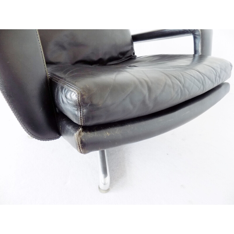 Vintage black armchair by Hans Kaufeld