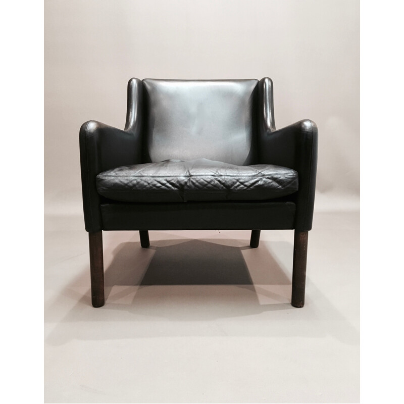 Scandinavian armchair in black leather and rosewood