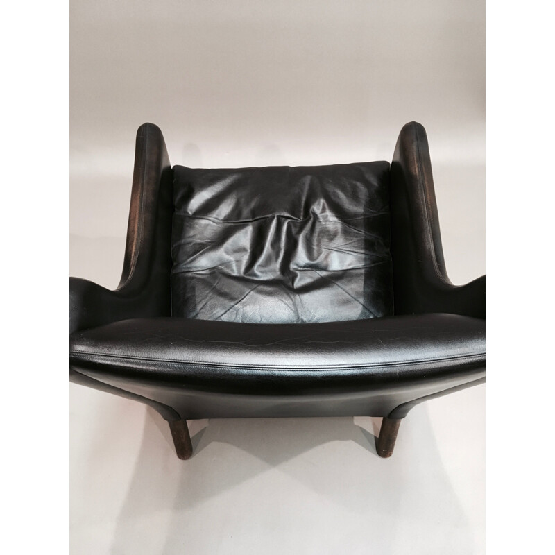 Scandinavian armchair in black leather and rosewood