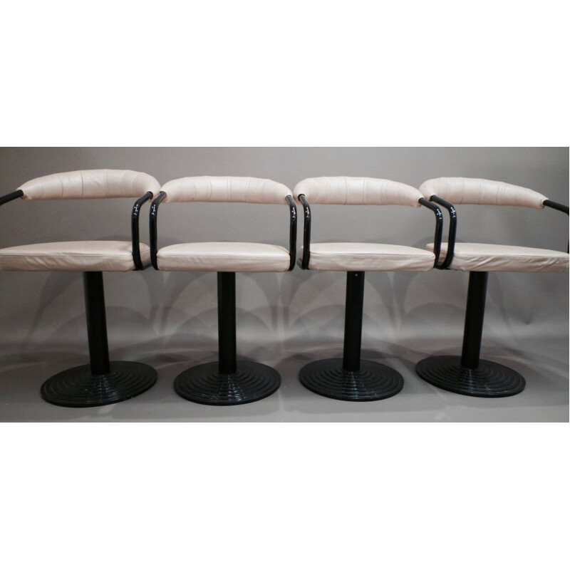 Set of 4 swiveling bar stools in metal