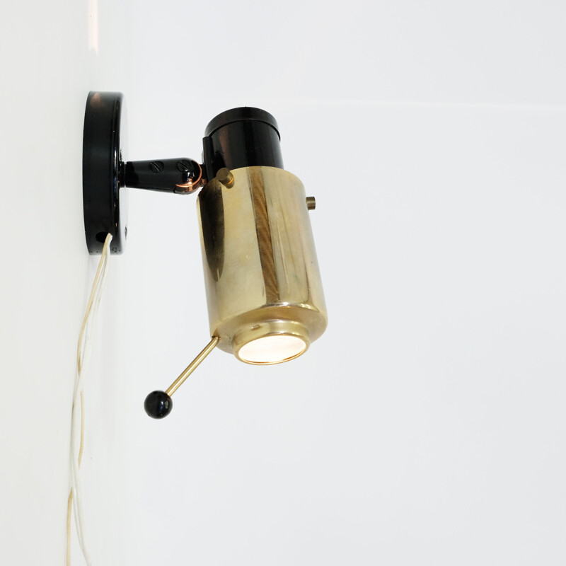 Vintage Zodiac two-tone sconce for LITA in black metal and brass 1950