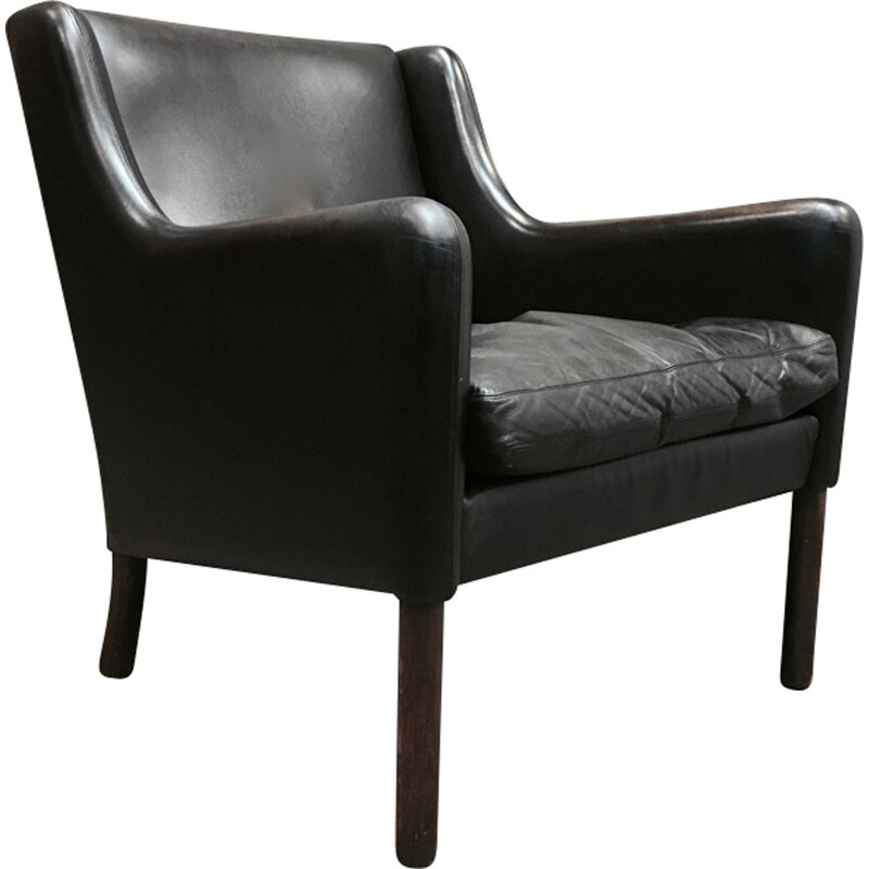 Scandinavian armchair in black leather and rosewood