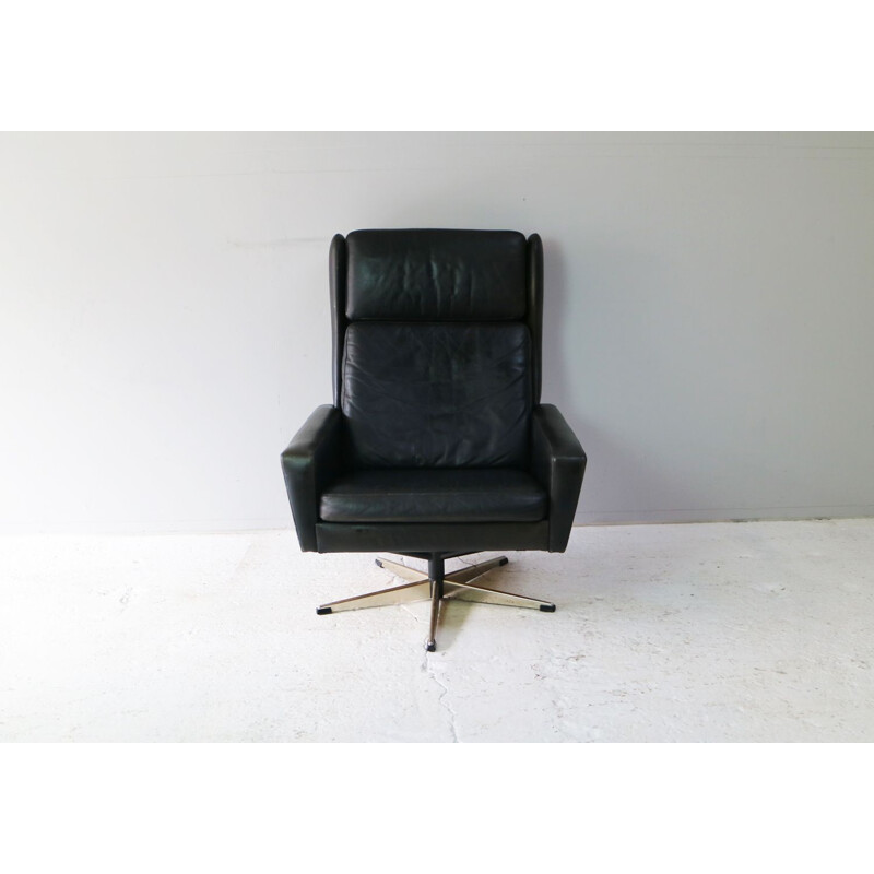 Vintage black leather armchair 1960