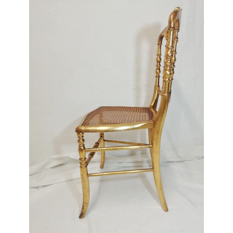 Vintage Napoleón chair in gilded wood 1980s