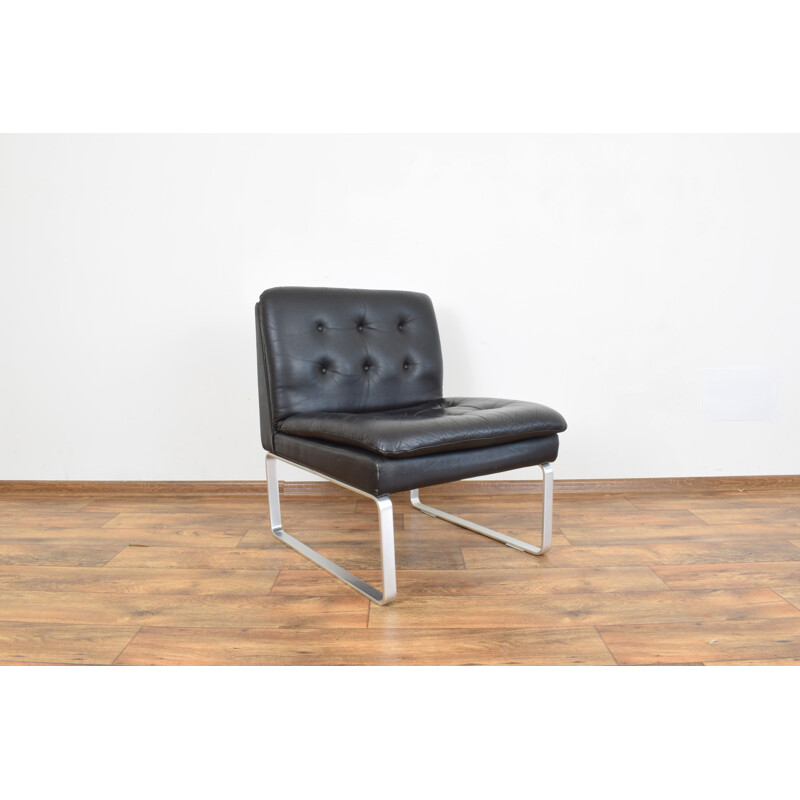 German lounge chair in leather and aluminium