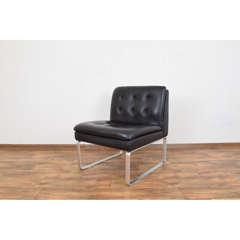 German lounge chair in leather and aluminium