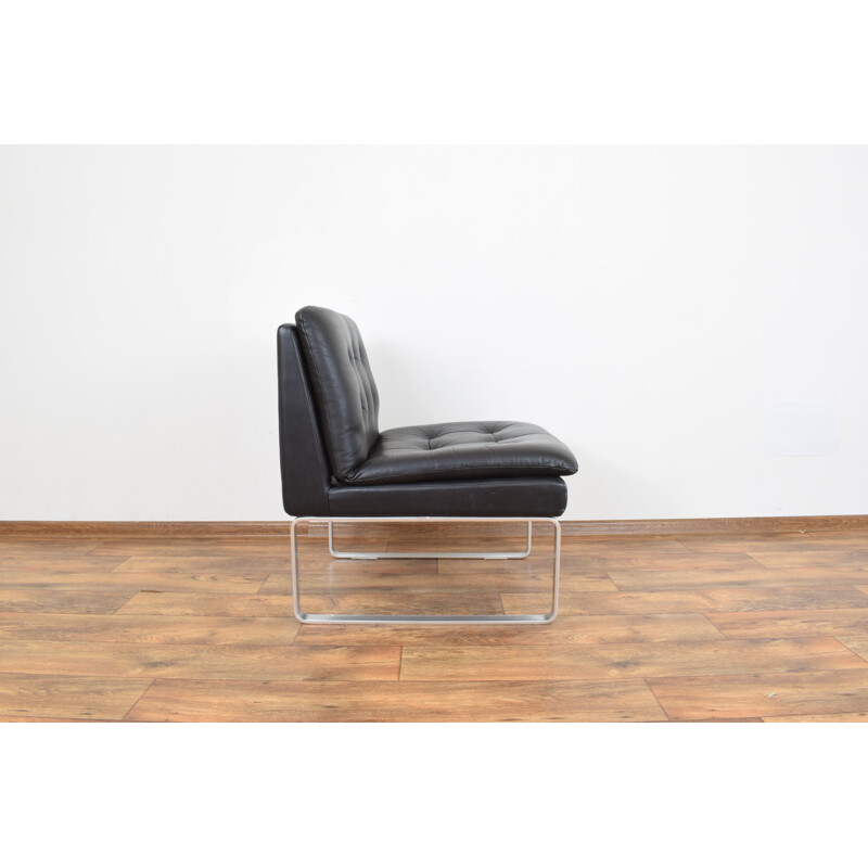 German lounge chair in leather and aluminium