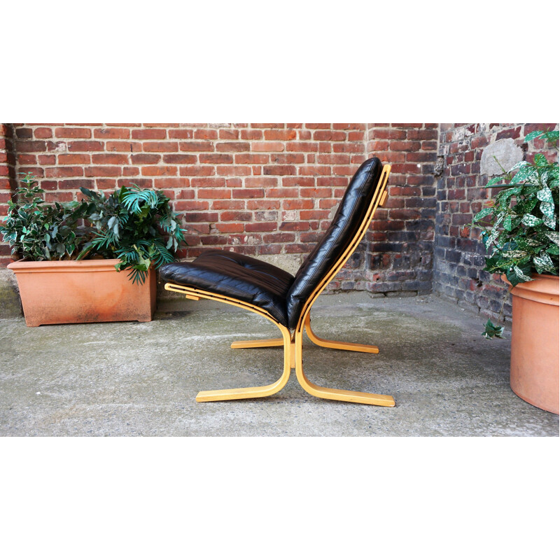 Vintage scandinavian Siesta armchair by Ingmar Relling in black leather