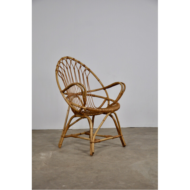 Vintage rattan armchair from the 60s 