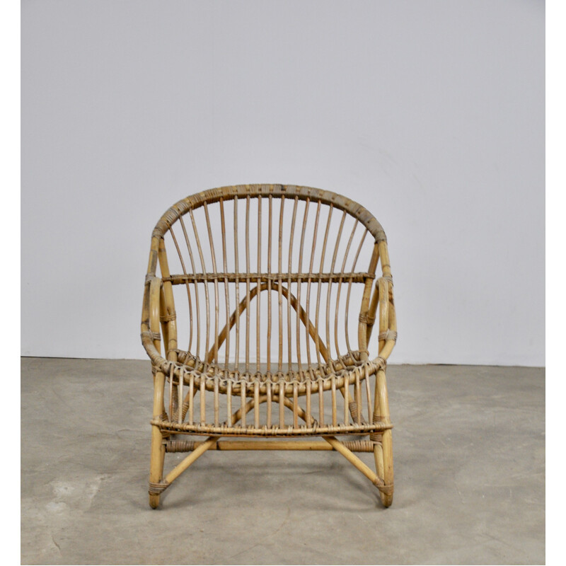 Vintage rattan armchair from the 60s 