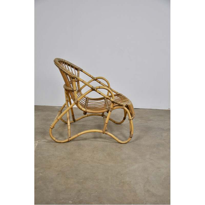 Vintage rattan armchair from the 60s 