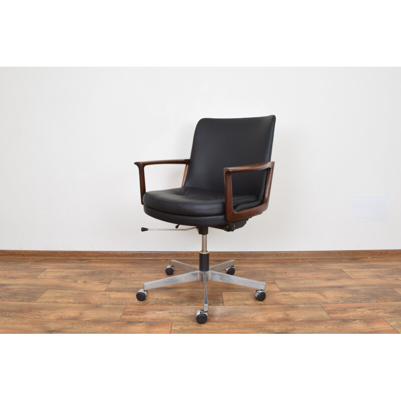Vintage office armchair in rosewood and black leather,1960