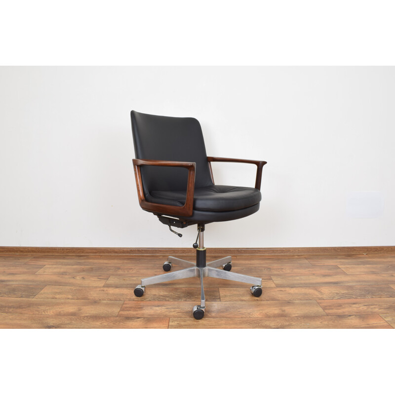 Vintage office armchair in rosewood and black leather,1960
