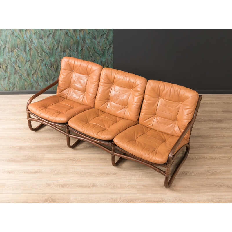 Vintage sofa in brown leather and with a bamboo frame 1960