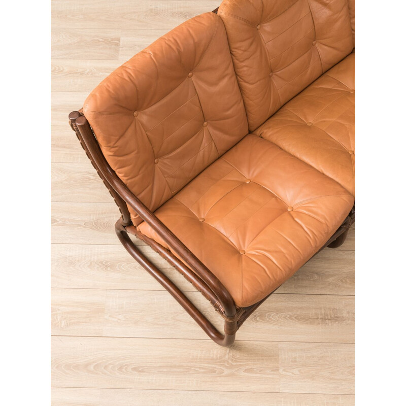 Vintage sofa in brown leather and with a bamboo frame 1960