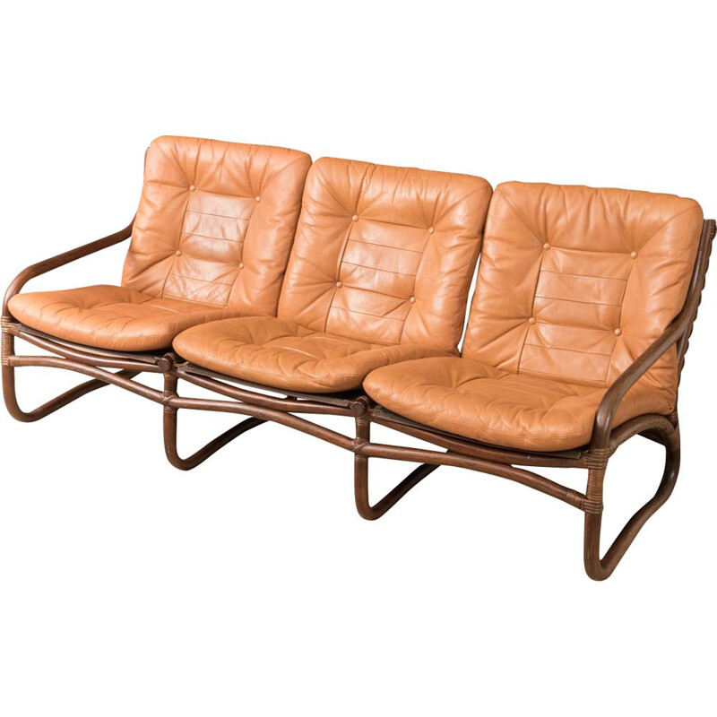 Vintage sofa in brown leather and with a bamboo frame 1960