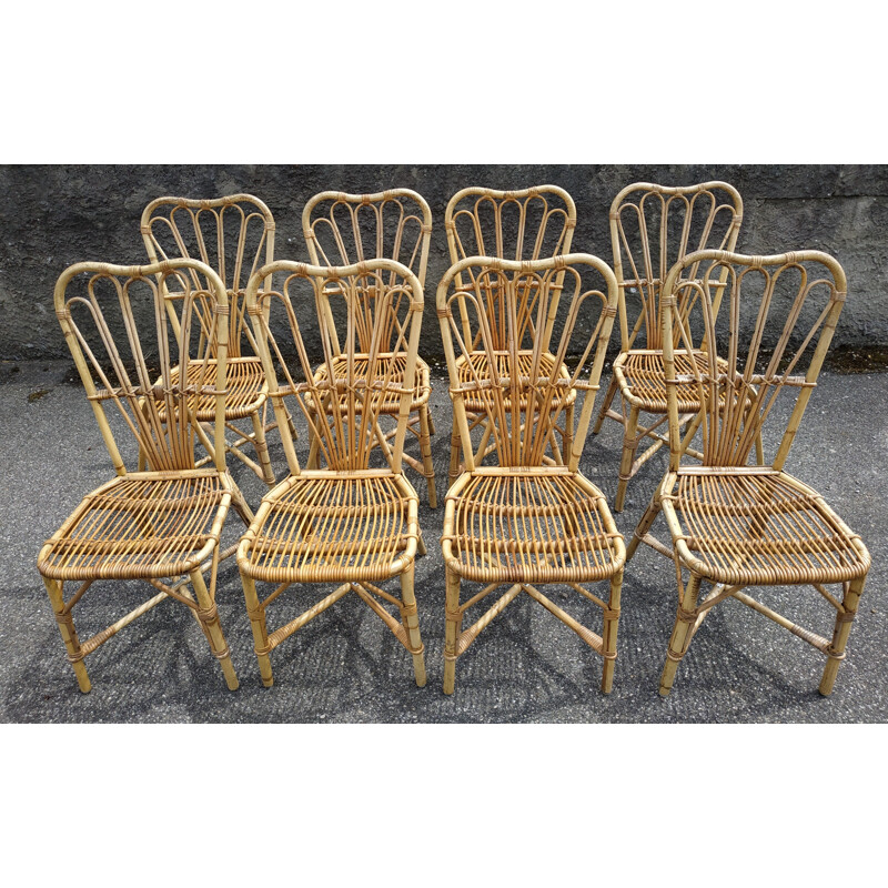 Suite de 8 chaises vintage en rotin Audoux et Minnet France 1950