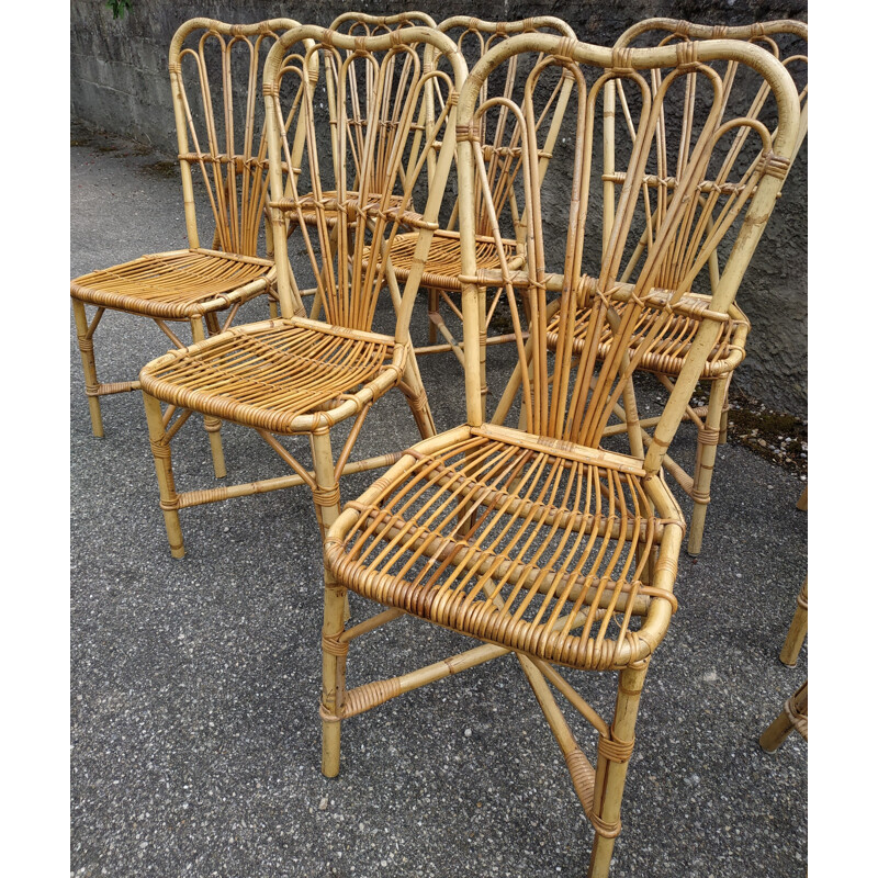 Set of 8 vintage chairs in rattan Audoux and Minnet France 1950