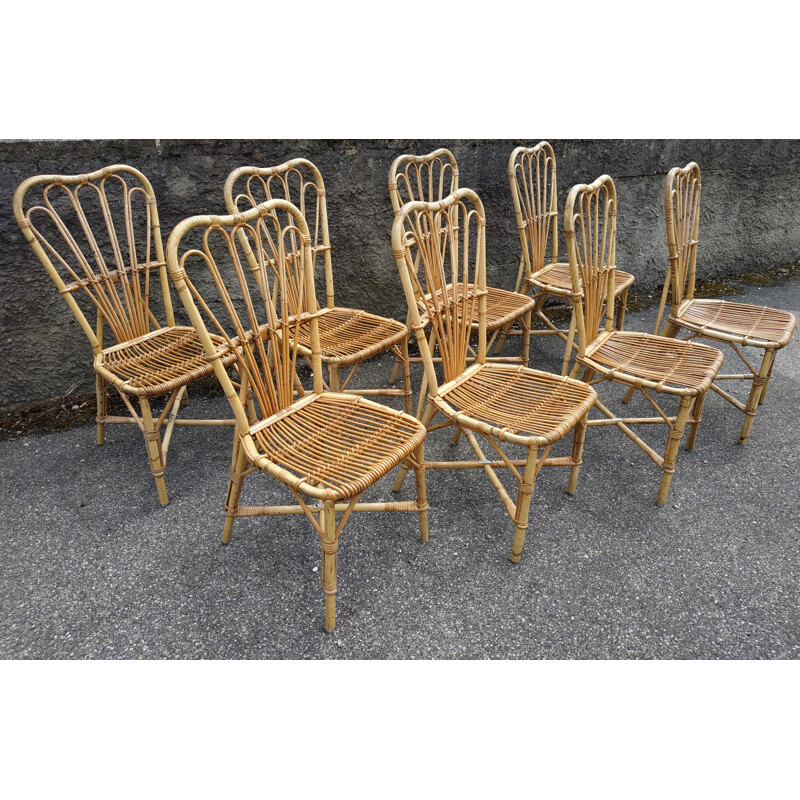 Suite de 8 chaises vintage en rotin Audoux et Minnet France 1950