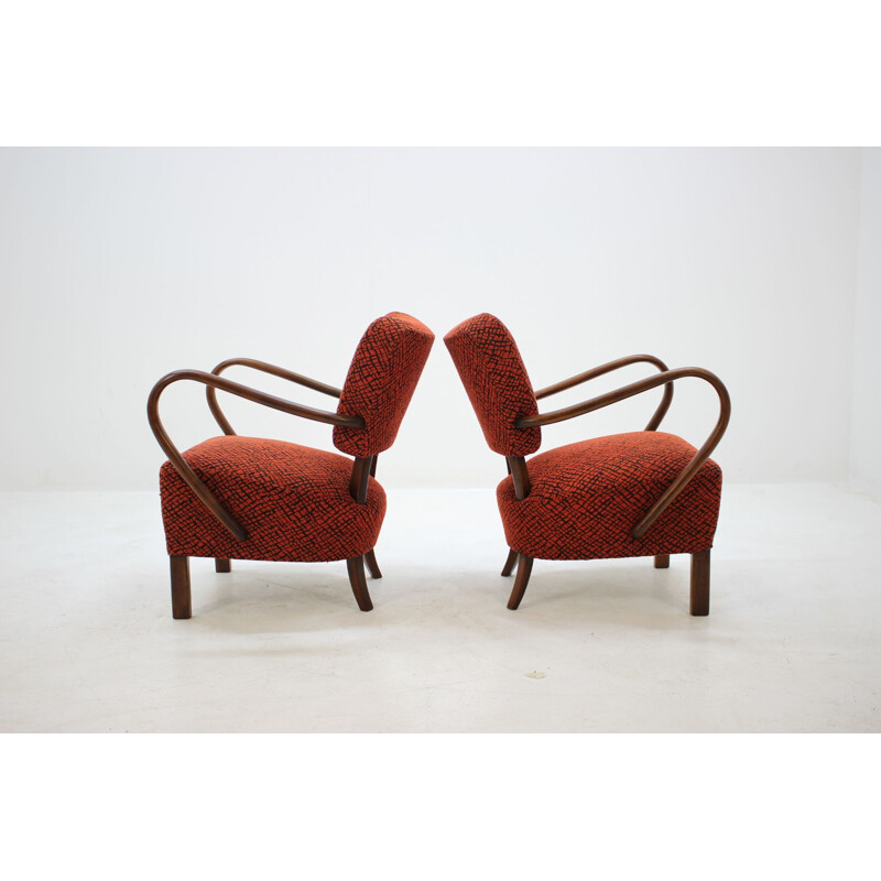 Set of 2 vintage H-237 armchairs in red fabric and wood 1950