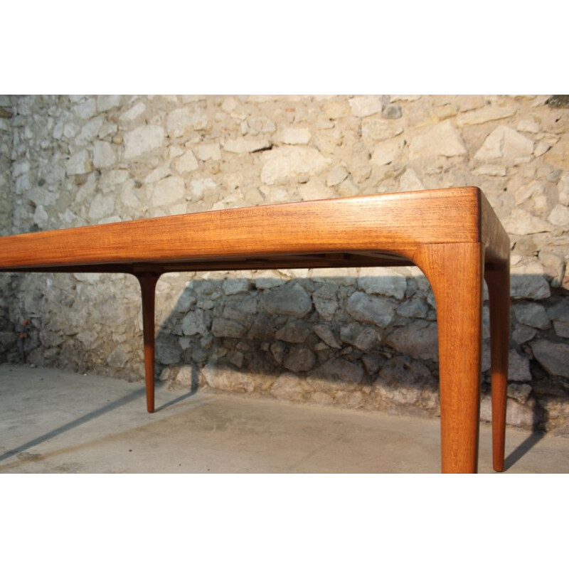 Extendable teak table by Johannes Andersen for Uldum