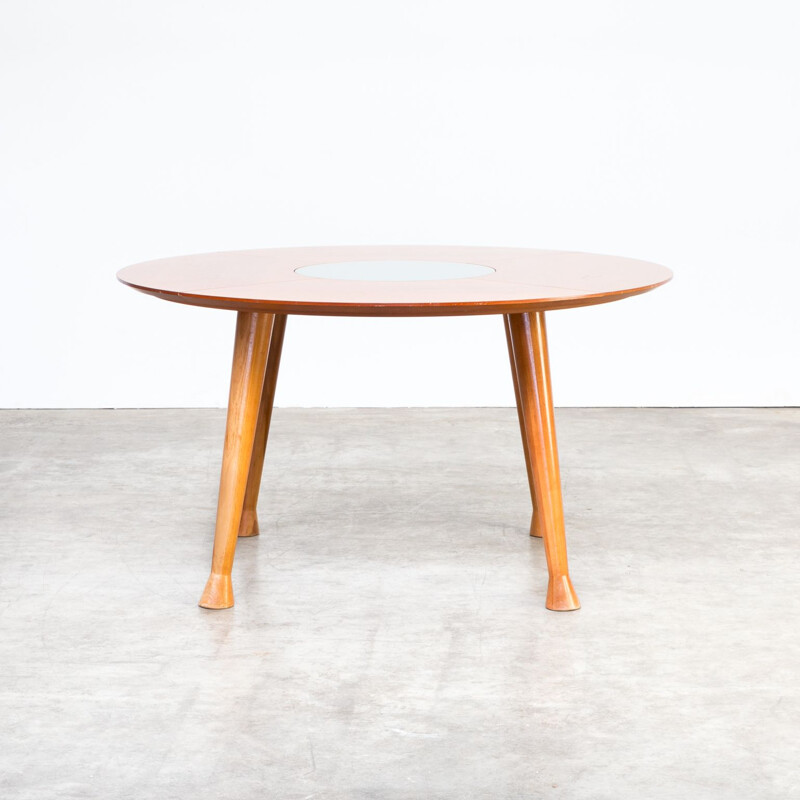 Vintage round dining table in teak 1990s