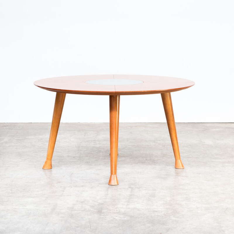 Vintage round dining table in teak 1990s