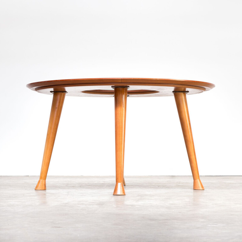 Vintage round dining table in teak 1990s